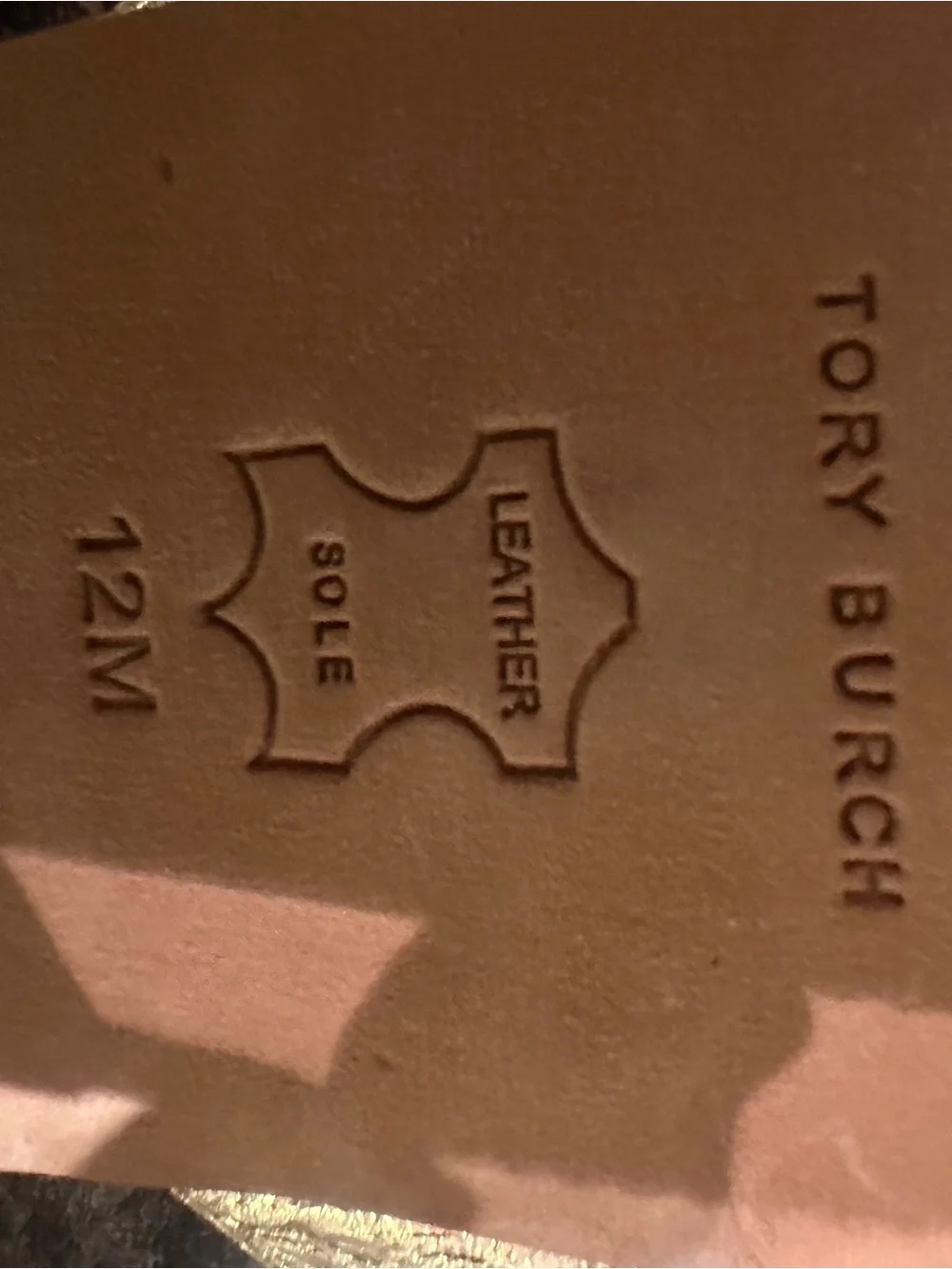 Tory Burch sleek gold or